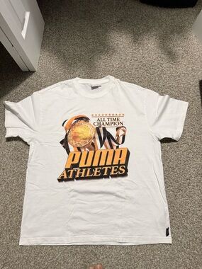 Puma White Tee with Green Logo Tag